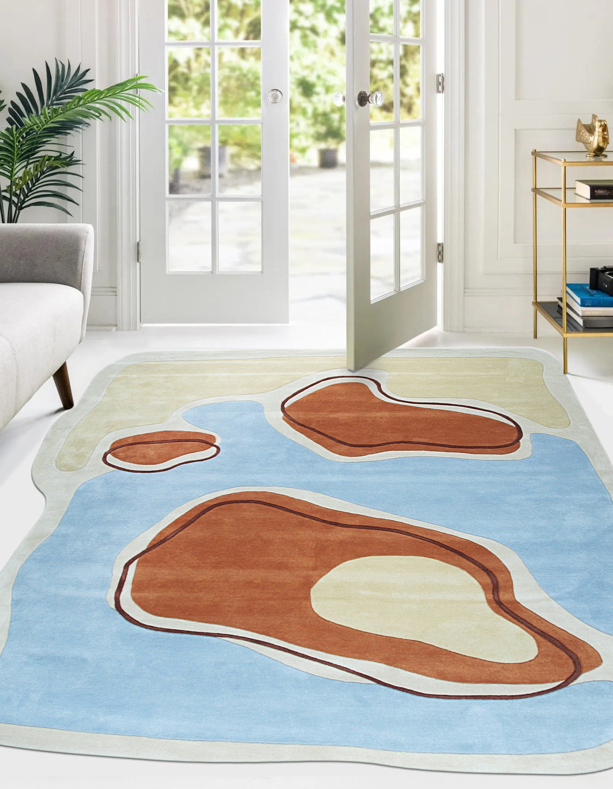 Yara Rustic Blue Hand Tufted Wool Rug, its textured weave and faded blue hues lending a touch of rustic charm to a modern living space.