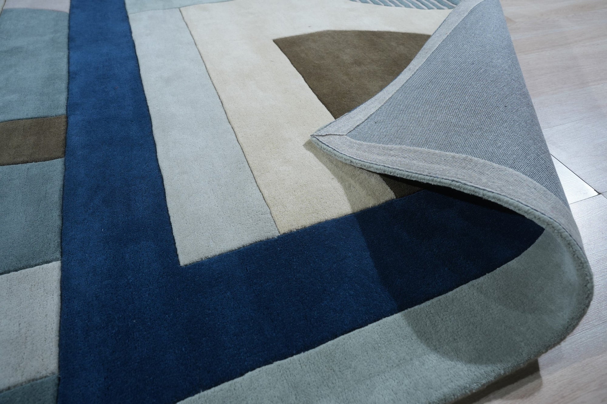 Bespoke Iris Multicolor Hand Tufted Wool Rug, vibrant swirls of color dance across a plush wool canvas, hand-tufted for luxurious texture.