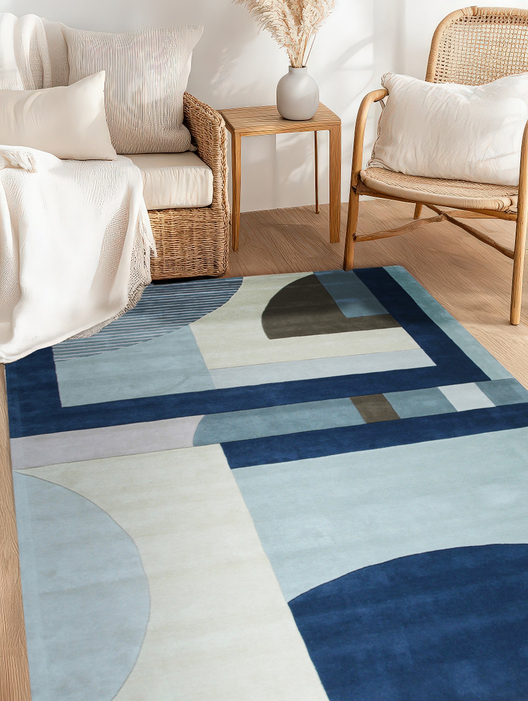 Bespoke Iris Multicolor Hand Tufted Wool Rug, vibrant waves of blues, purples, greens, and creams cascade across a luxuriously textured wool surface, viewed in a styled living room setting.
