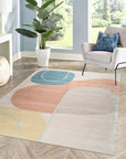 Yara Laine Multicolor Hand Tufted Wool Rug, displaying a vibrant explosion of color in a modern geometric pattern, softens a contemporary living space with its plush, hand-tufted texture.