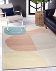 Yara Laine Multicolor Hand Tufted Wool Rug, vibrant hues dance across a cozy living room, its wool pile adding warmth and texture to the inviting space.