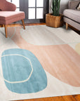 Yara Laine Multicolor Hand Tufted Wool Rug, blending vibrant hues in a textured, handcrafted design, graces a modern living space.