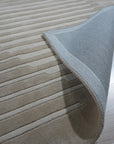 Maya Bianca Beige Hand Tufted Wool Rug, anchoring a living space with its soft, neutral tones and plush wool pile.