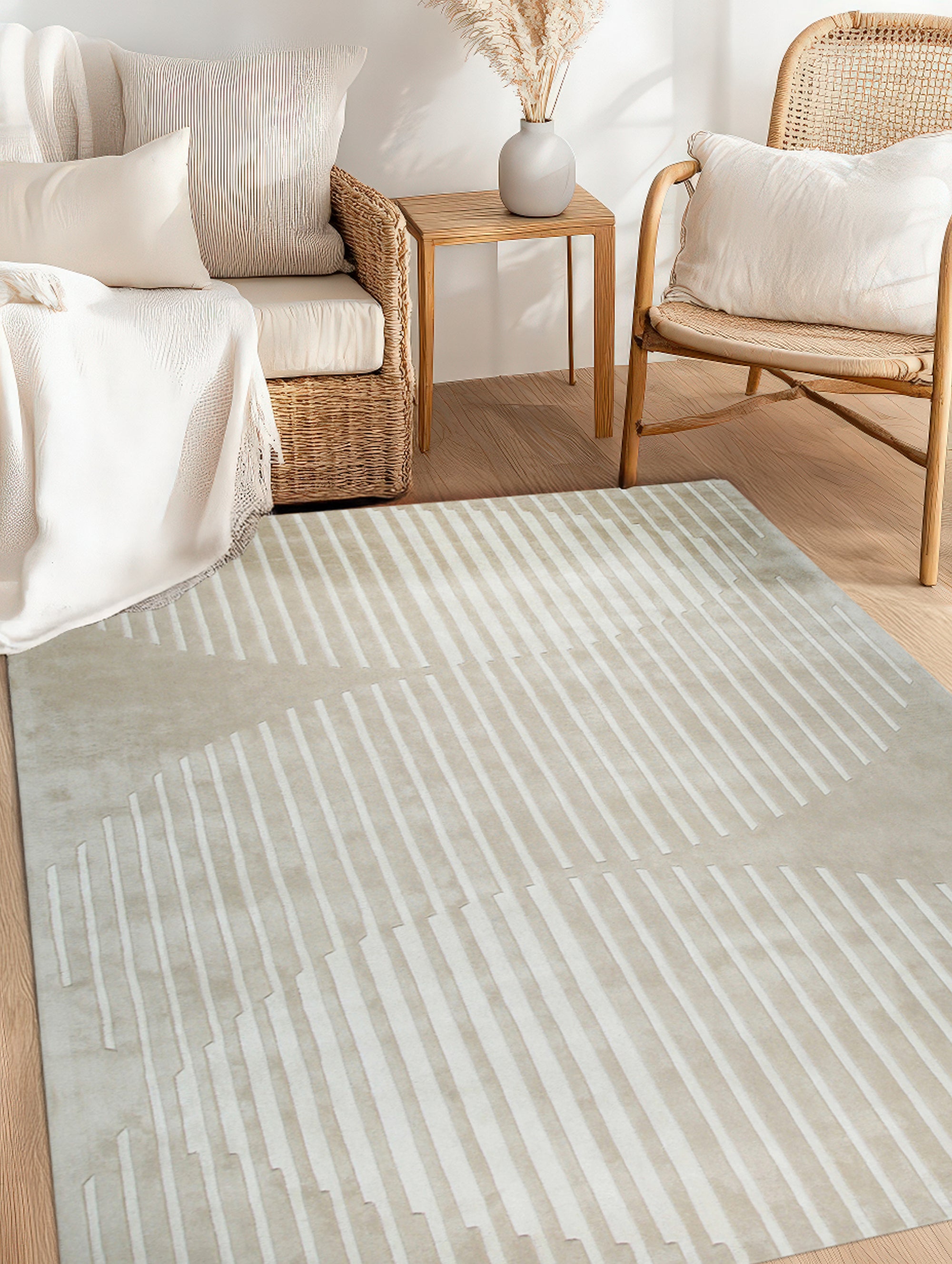 Maya Bianca Beige Hand Tufted Wool Rug, a creamy neutral oasis underfoot, anchors a modern living room with subtle texture and handcrafted warmth. Sunlight highlights the dense wool pile and the rug's calming, minimalist design.