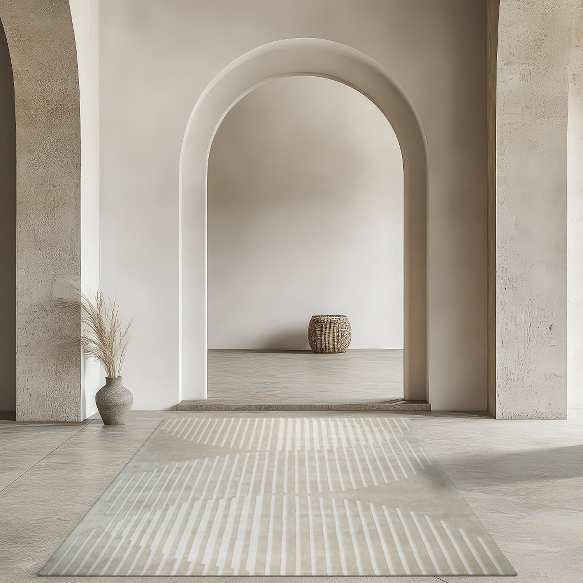 Maya Bianca Beige Hand Tufted Wool Rug, a textured expanse of soft beige wool, anchors a sun-drenched living room with its subtle, hand-tufted design.