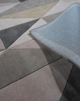 Trendy Classic Multicolor Hand Tufted Wool Rug, its vibrant hues and plush texture lending warmth to a bright living space with modern furniture.