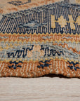 Luna Kilim Blue Hand Knotted Wool Rug, a hand-knotted wool rug in shades of blue, seen showcasing its detailed Kilim design.