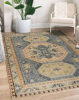 Luna Kilim Blue Hand Knotted Wool Rug, showing intricate geometric patterns in shades of blue, cream, and terracotta, displayed on a hardwood floor.