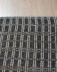 Lila Talia Gold Flatweave Rug, warm gold and ivory tones blend in a softly patterned flatweave, adding understated elegance to a sunlit room setting.