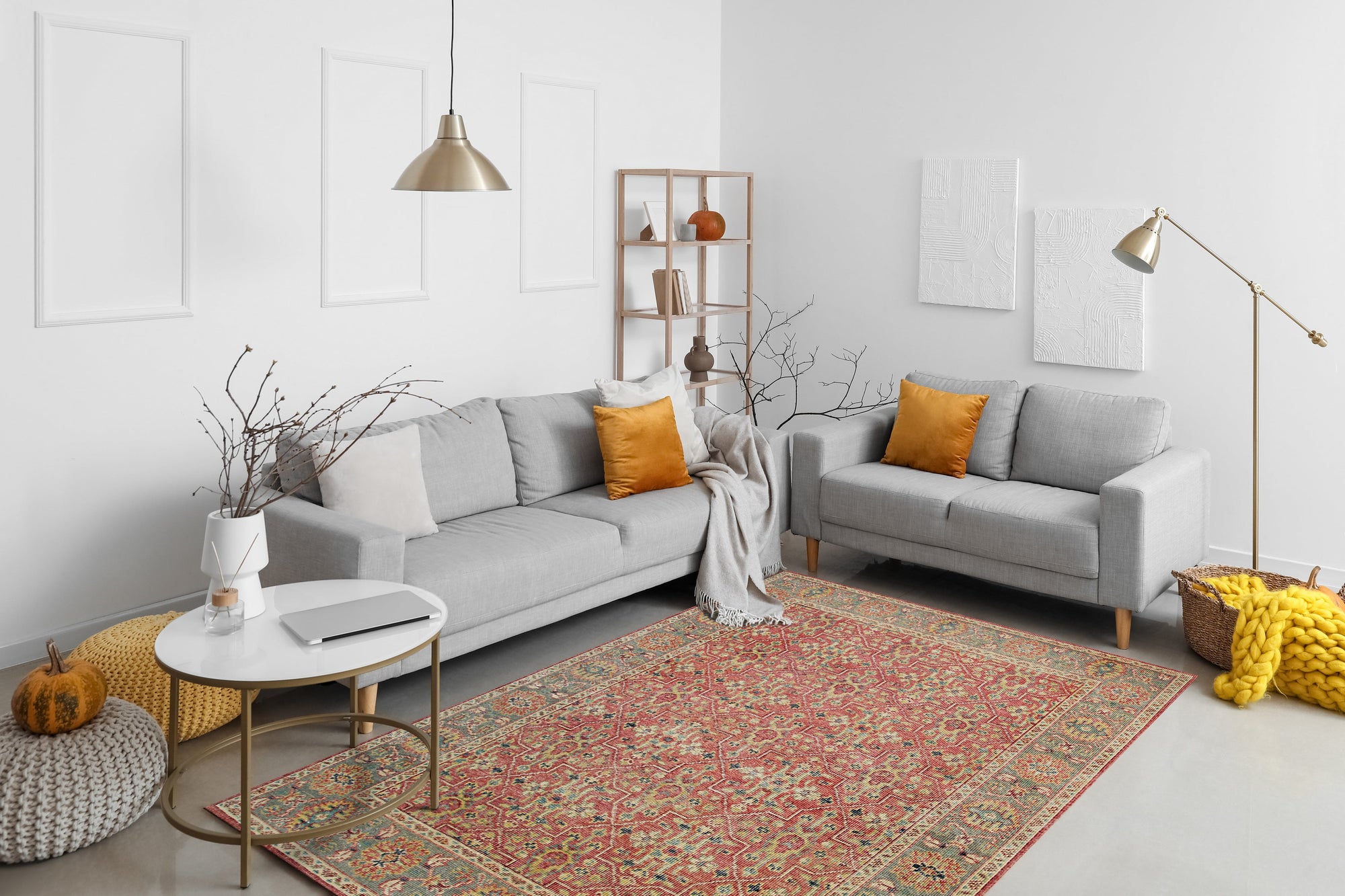 Celia Oushak Rust Hand Knotted Wool Rug, displaying intricate floral patterns in warm rust tones, hand-knotted for a luxurious texture, fills a brightly lit room with soft, diffused light.