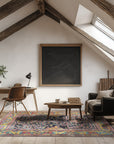 Comfortable Celia Blue Hand Knotted Wool Rug, showcasing subtle variations in blue hues across its hand-knotted wool texture, displayed in a bright living room setting.