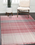 Maya Giselle Pink Flatweave Wool Rug, a delicate rose-hued wool rug with a subtly textured flatweave, adding warmth and understated elegance to a light-filled living space.