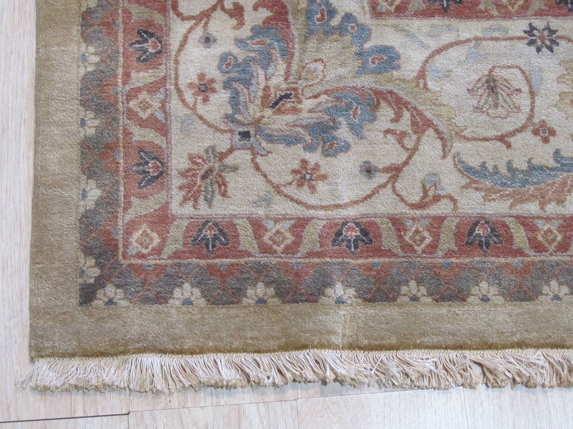 Versatile Agra Beige Hand Knotted Wool Rug, a subtle beige and cream wool rug with a traditional, intricate Agra design, enhancing a modern living space.