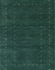 Isolated view of Sloane Ava Green Handmade Wool Rug, highlighting its intricate design.