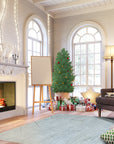 Trendy Dahlia Beige Handmade Wool Rug graces a warmly lit living room; a plush, textured accent anchoring a modern seating area with neutral tones and subtle floral motifs.
