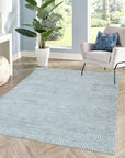 Trendy Dahlia Beige Handmade Wool Rug, showcasing a subtle floral pattern in calming beige tones, its hand-knotted wool texture adding warmth to a modern living space.