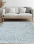 Trendy Dahlia Beige Handmade Wool Rug, showcased in a bright living room setting. Creamy beige tones and textured wool create a warm, inviting space.