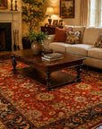 Kira Zinnia Rust Hand Knotted Wool Rug styled in a modern living room - area rug lifestyle photo