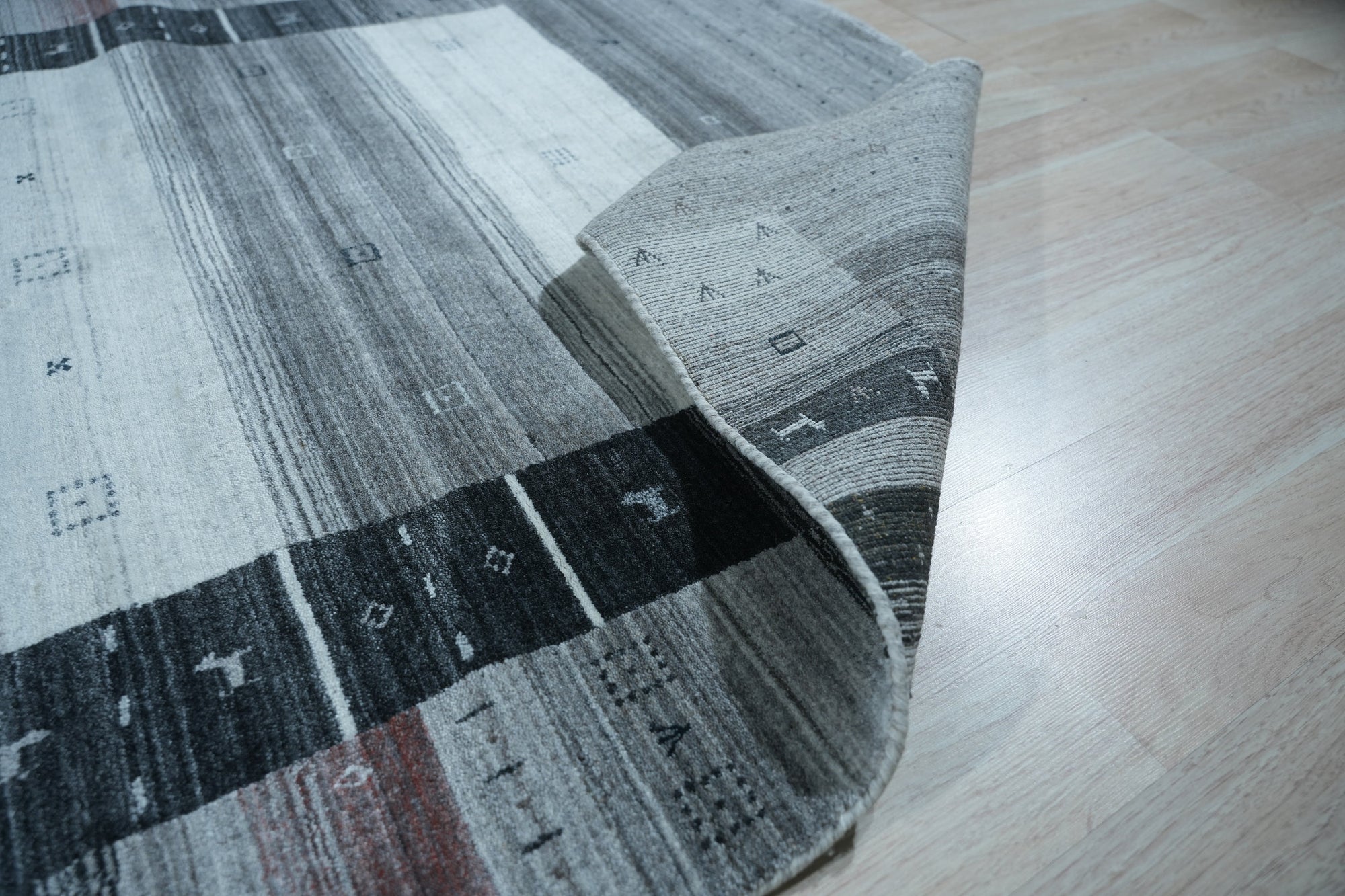 Sophie Gabbeh Gray Handmade Wool Rug, soft gray wool texture with subtle variations, inviting warmth and comfort into a modern living space.