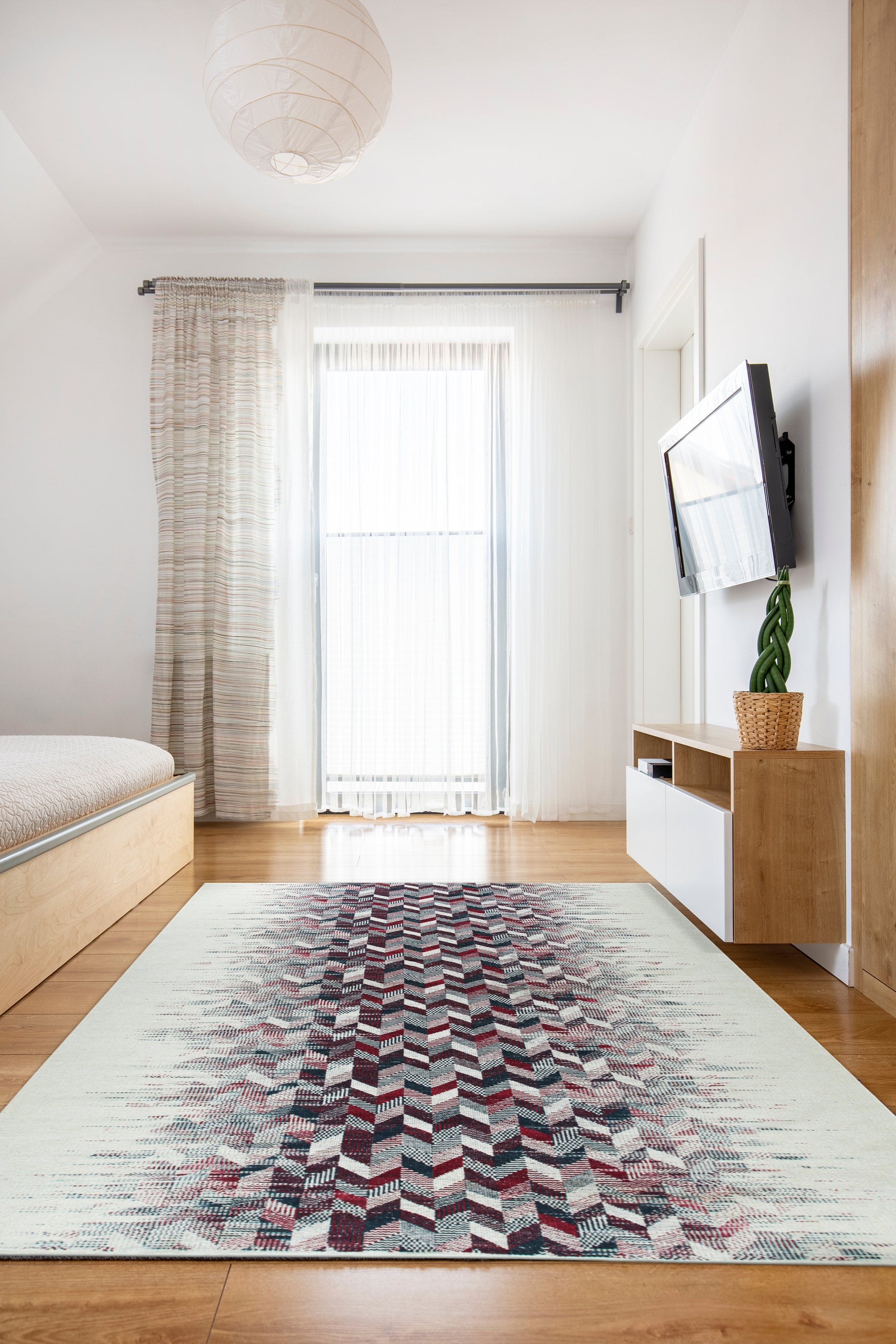 Brenda Refined Multicolor Flatweave Wool Rug showcased in a bright living room setting. Woven wool threads create a vibrant, flatweave design with an array of blended colors.