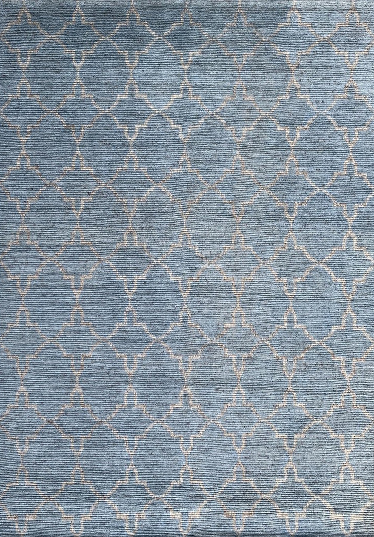 Isolated view of Versatile Agra Blue Hand Knotted Wool Rug, showcasing its intricate floral and geometric design in shades of blue, ivory, and hints of earth tones.
