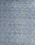 Isolated view of Versatile Agra Blue Hand Knotted Wool Rug, showcasing its intricate floral and geometric design in shades of blue, ivory, and hints of earth tones.