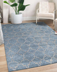 Versatile Agra Blue Hand Knotted Wool Rug, showcasing a detailed traditional pattern in varying shades of blue and cream, seen in a well-lit room setting with neutral furniture.