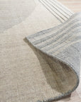 Majestic Chic Charcoal Handmade Wool Rug displayed, showcasing subtle texture and sophisticated charcoal tones creating a grounded, modern aesthetic.