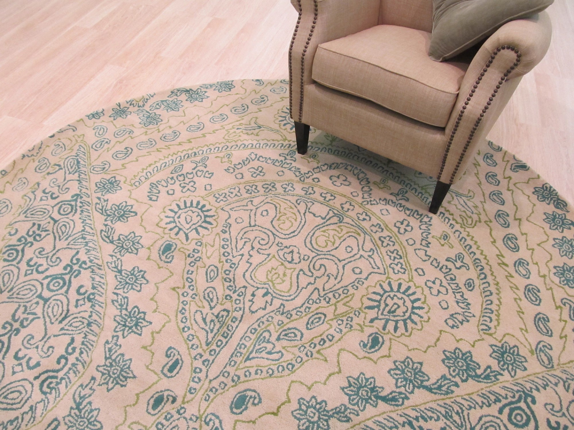 Beautiful Alluring Green Hand Tufted Wool Rug, its verdant hues and plush texture radiating warmth within a sun-drenched living space.