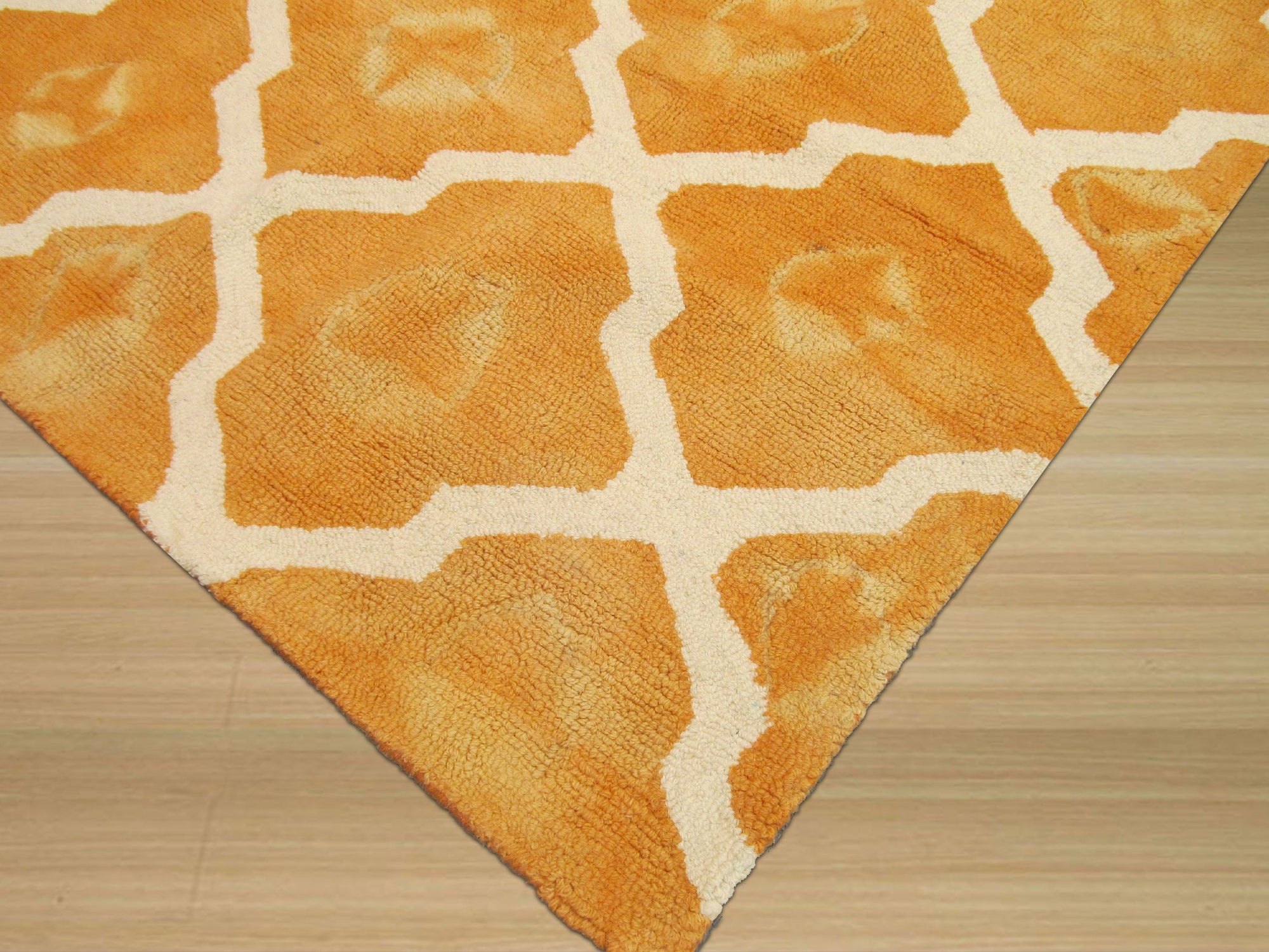 Refined Stylish Orange Hand Tufted Wool Rug, vibrant orange wool pile with a subtle pattern, laid in a bright, modern living space.