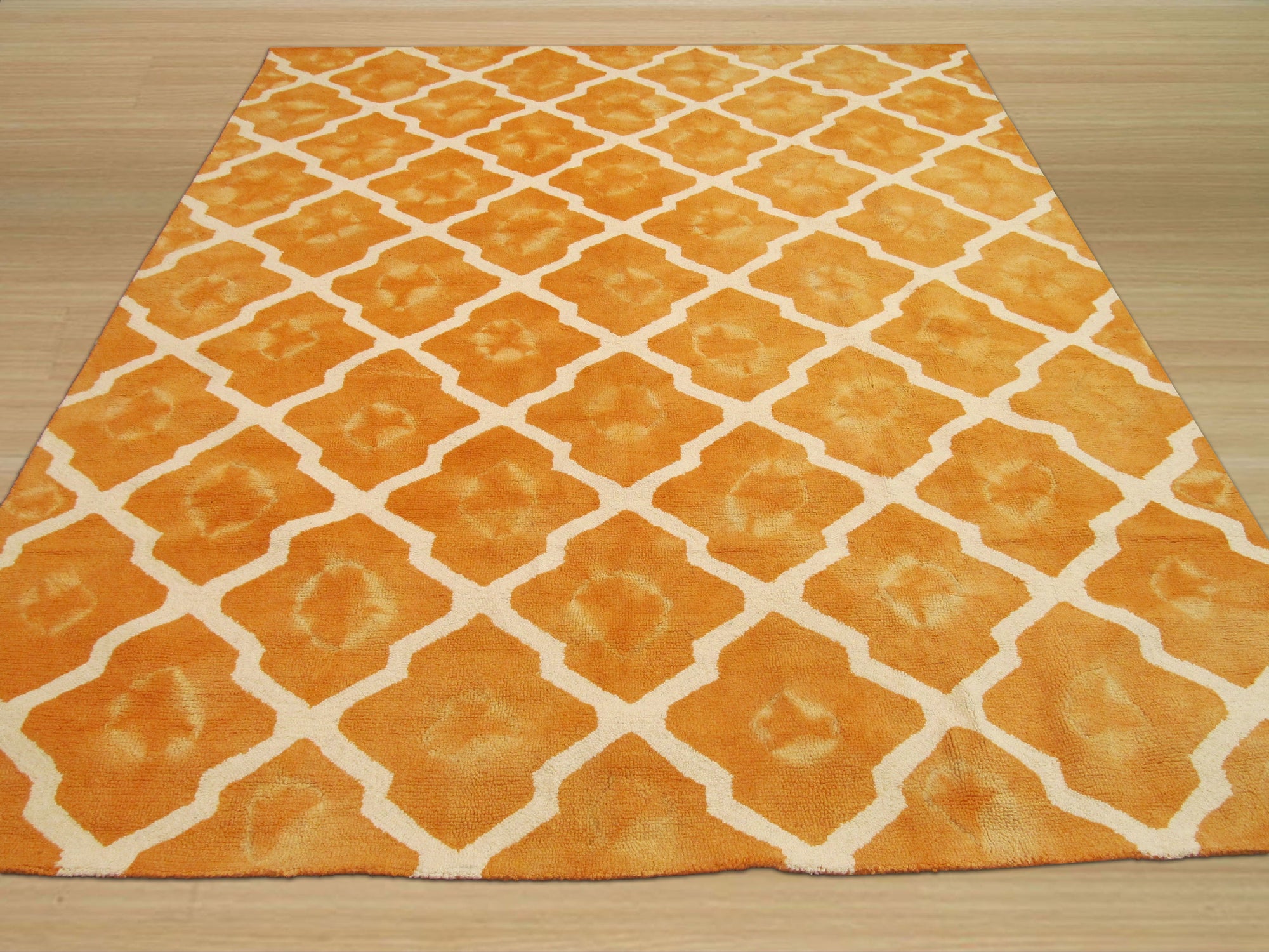 Refined Stylish Orange Hand Tufted Wool Rug, warm vibrant orange hand-tufted wool rug displayed within a light-filled living space, showcasing its texture and stylish design against a neutral backdrop.