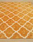 Refined Stylish Orange Hand Tufted Wool Rug, warm vibrant orange hand-tufted wool rug displayed within a light-filled living space, showcasing its texture and stylish design against a neutral backdrop.
