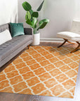 Refined Stylish Orange Hand Tufted Wool Rug, textured waves of vibrant orange cascading across the hand-tufted wool, bringing warmth and a modern aesthetic to a living space.