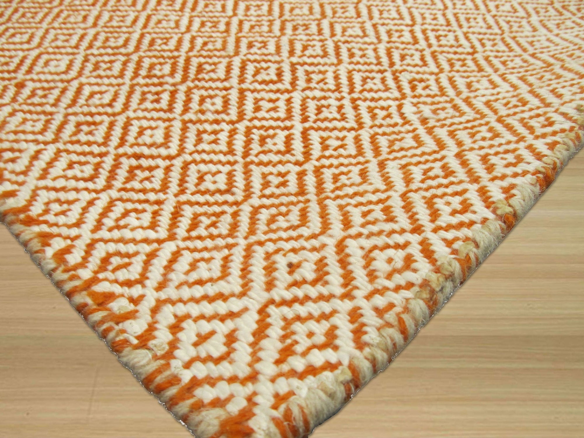 Beautiful Trellis Orange Hand Tufted Wool Rug, warm orange hand-tufted wool creation featuring a crisp trellis pattern, enriching a bright, modern living space.