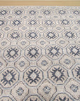 Para Giselle Blue Hand Knotted Rug, presenting intricate patterns and a soothing blue palette, displayed in a well-lit interior setting.