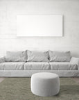 Chic Marrakesh Camel Hand Knotted Wool & Viscose Rug, a camel and ivory wool and viscose rug with a textured geometric design, seen in a bright, minimalist living room.