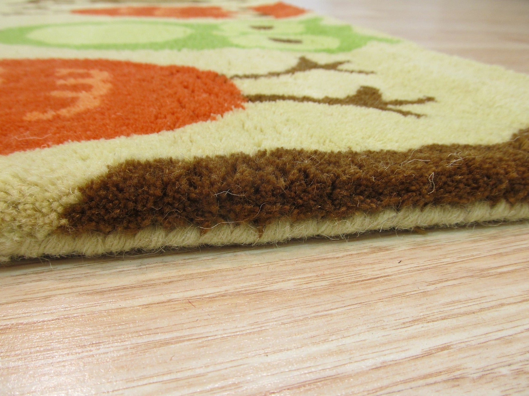 Bespoke Dazzling Nan Hand Tufted Wool Rug, a vibrant, multicolored rug with a dynamic, abstract design, adding warmth and texture to a modern living space.