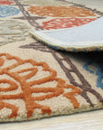 Artistic Sumptuous Beige Hand Tufted Wool Rug, its soft beige tones and hand-tufted texture adding warmth to a modern living space.