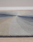 Stylish Timeless Blue Hand Tufted Wool Rug, anchoring a bright living room with its rich blue tones and textured wool construction, complemented by modern furniture.