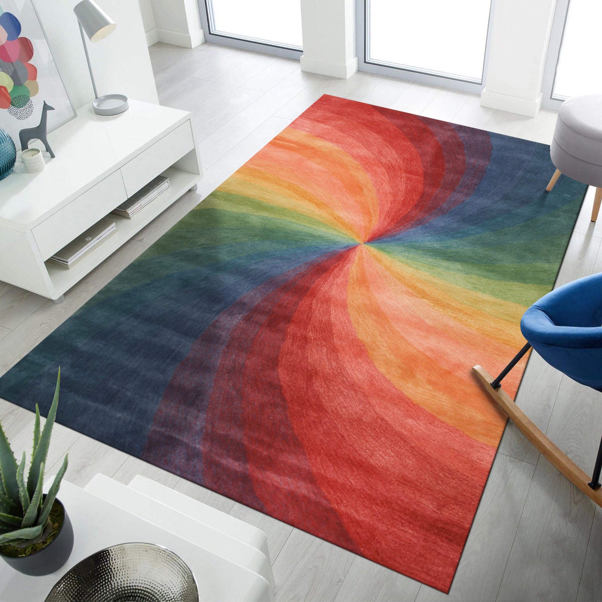 Talia Classic Rainbow Hand Tufted Wool Rug, bursting with vibrant, hand-tufted arcs of rainbow hues across a neutral backdrop, anchors a bright and airy living room with modern furniture and playful decor.