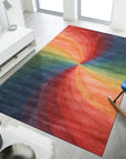 Talia Classic Rainbow Hand Tufted Wool Rug, bursting with vibrant, hand-tufted arcs of rainbow hues across a neutral backdrop, anchors a bright and airy living room with modern furniture and playful decor.