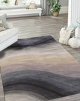 Xena Violet Blue Hand Tufted Wool Rug, a luxurious blend of violet and blue hues in a hand-tufted wool construction, subtly enhancing a modern living room setting.