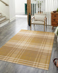 Chic Serene Yellow Flatweave Wool Rug, its soft yellow hue illuminating a modern living space. Flatweave construction evident in its subtle texture, complementing neutral furniture and natural light.
