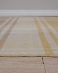Chic Serene Yellow Flatweave Wool Rug, soft yellow tones and flatweave texture create a serene atmosphere in a room setting.