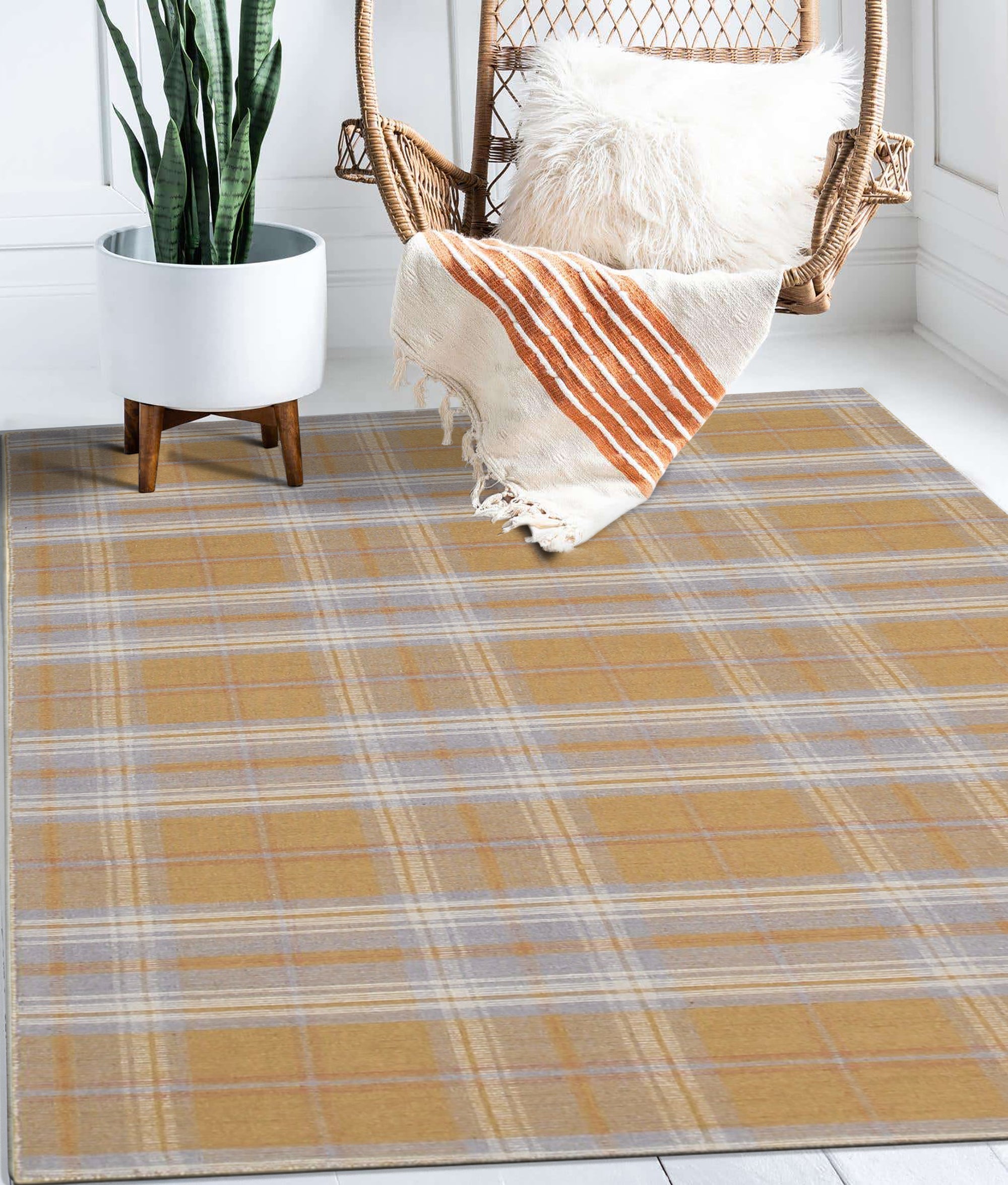 Sarrah Delicate Gold Flatweave Wool Rug, a subtle gold flatweave wool rug with a delicate, neutral design, enriching a light-filled living space.