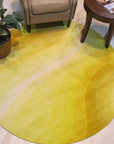 Inviting Ruby Yellow Hand Tufted Wool Rug, vibrant ruby and yellow hues swirl across a plush, hand-tufted wool rug, adding warmth and texture to a stylish living space.
