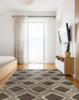Xena Ava Charcoal Hand Tufted Wool Rug, a charcoal wool rug with subtle textured patterns, displayed in a bright, modern living space.