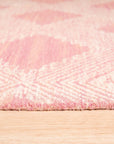 Since the image position is 7, here's the alt text:
 
 Unique Sloane Pink Hand Tufted Wool Rug, its soft pink hues and textured wool construction adding a touch of warmth and sophistication to a styled living space.