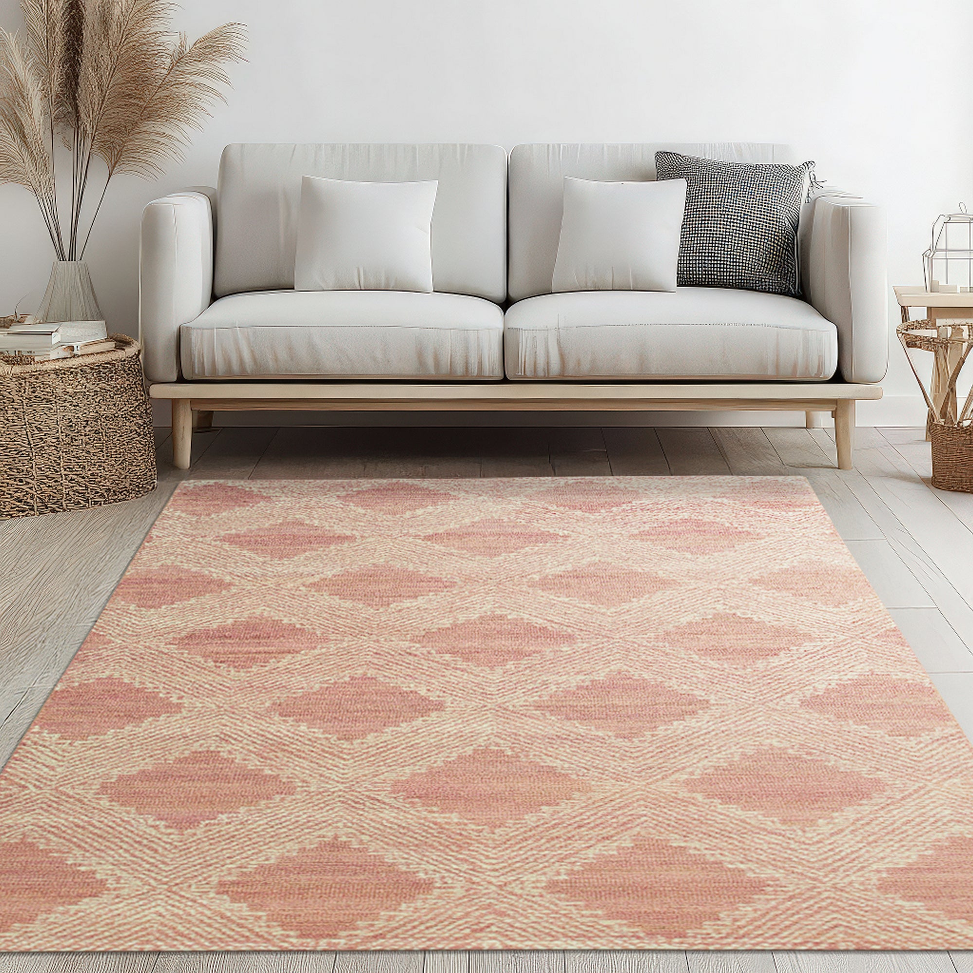 Unique Sloane Pink Hand Tufted Wool Rug, its soft pink hues and textured wool pile showcased in a bright, modern living room.