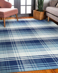 Sophisticated Elegant Blue Flatweave Wool Rug, showing a close-up of its tightly woven, flat surface and cool blue tones, revealing the rug's subtle texture.